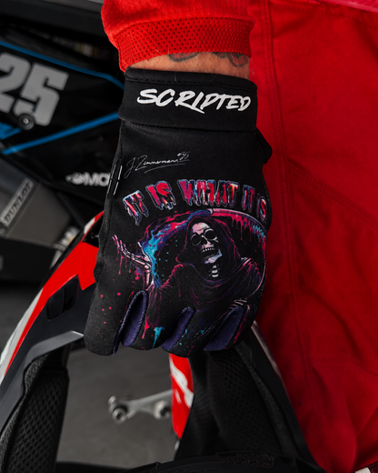 Close up shot of a black Scripted Glove with colourful graphic "It is what it is"